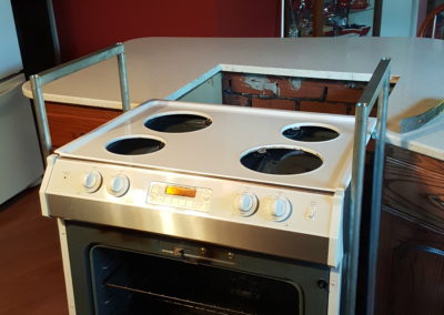 Stove on wheels in kitchen