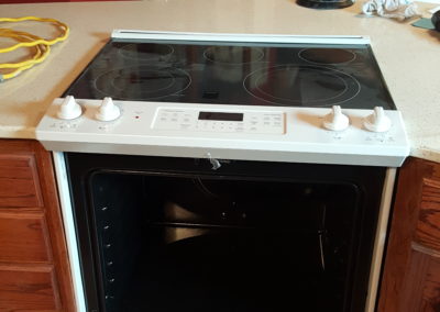 Modern kitchen stove with open oven